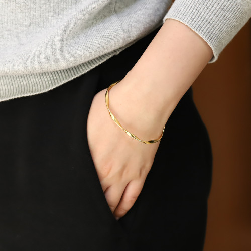 Dámsky pevný náramok z chirurgickej ocele zlatý BSSG202